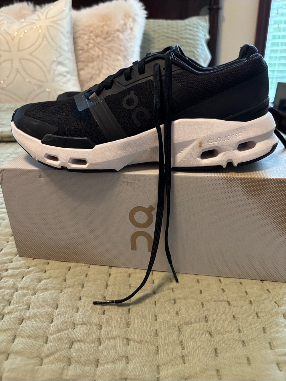 On Running Women’s Black and White Cloudpulse shoe.
